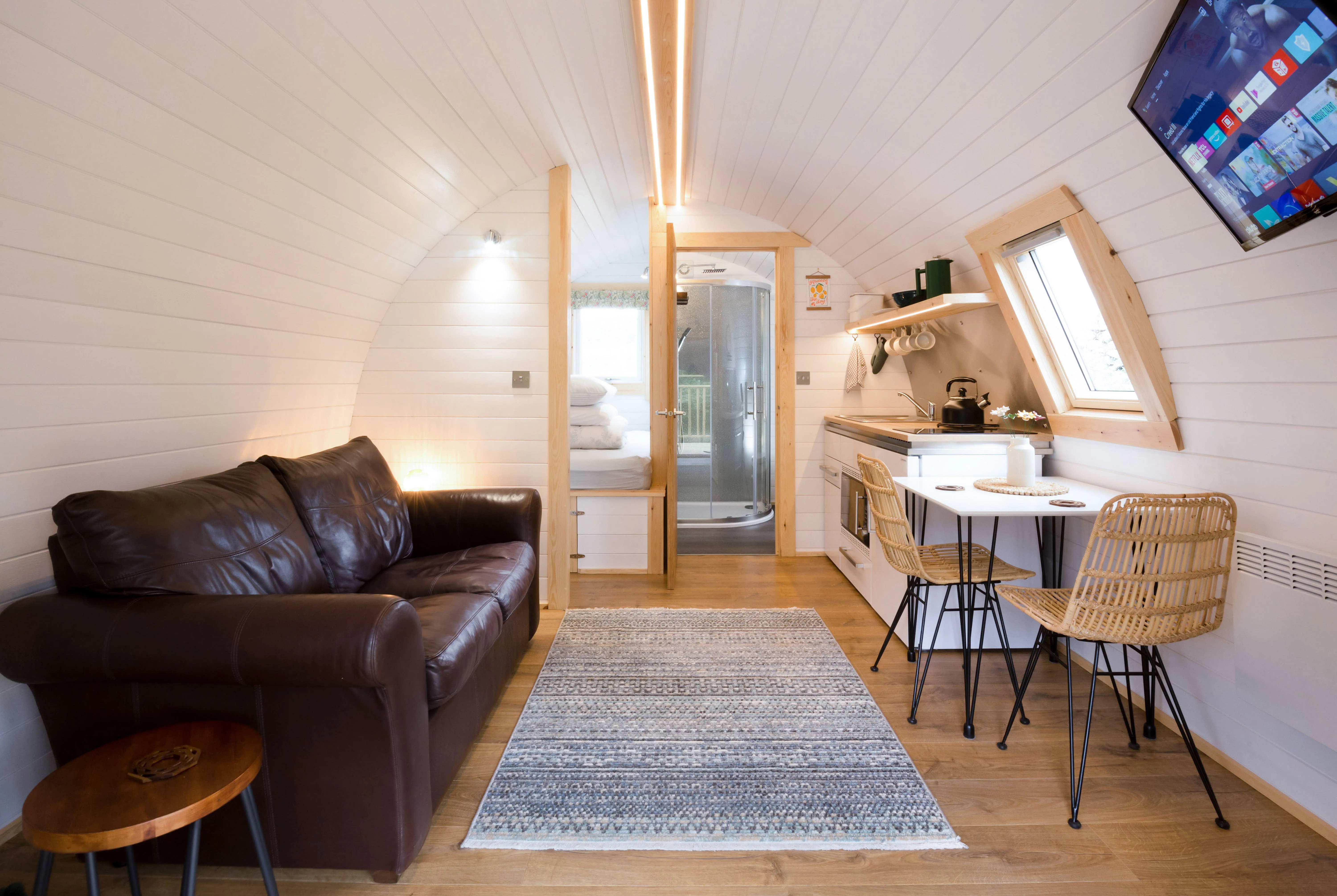 Muckle Meadow Pod interior — king bed and living area